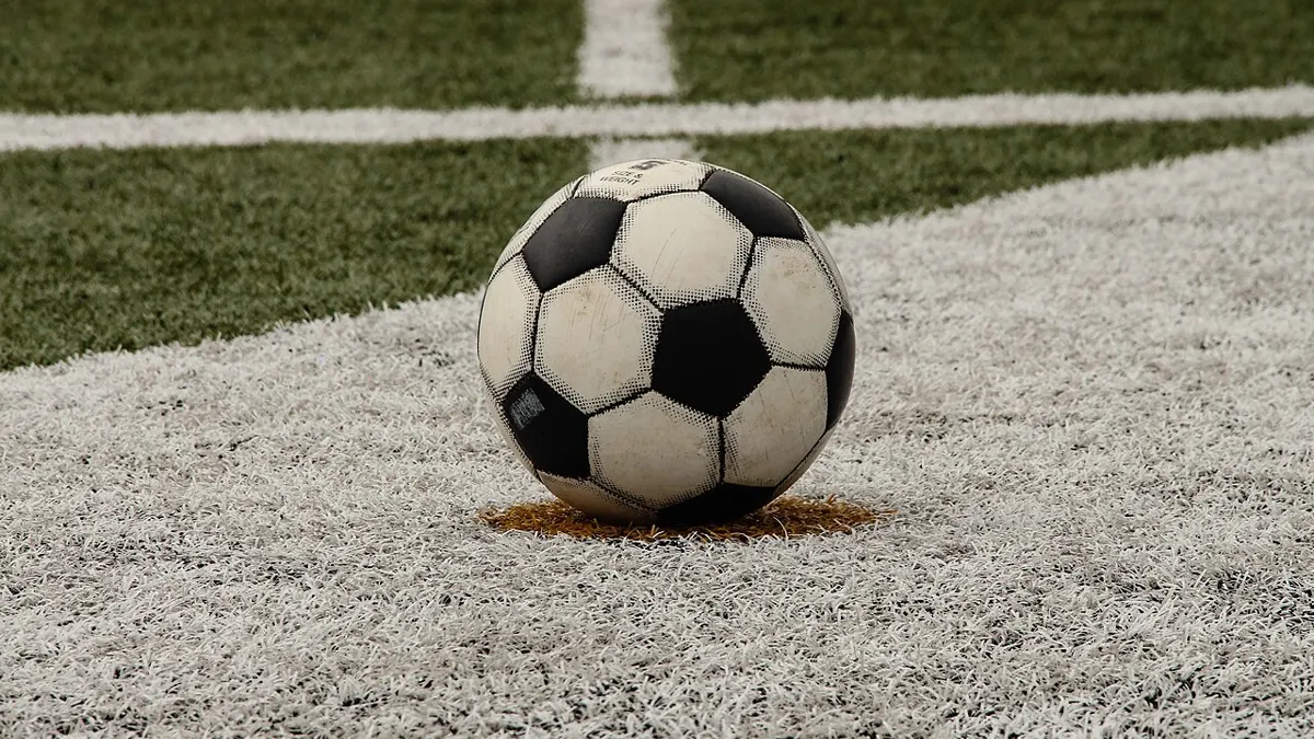 Football on a pitch - pronosticos inglaterra vs argentina
